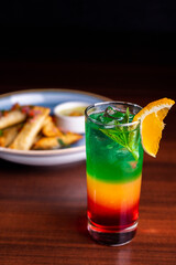 Photobook of cocktails on the bar counter.