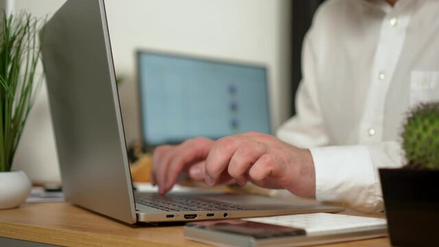 Man hands type on laptop keyboard, businessman finished work and close notebook. Hands touch typing pointing cloud data social network media. Office desk, workplace, individual freelancer entrepreneur