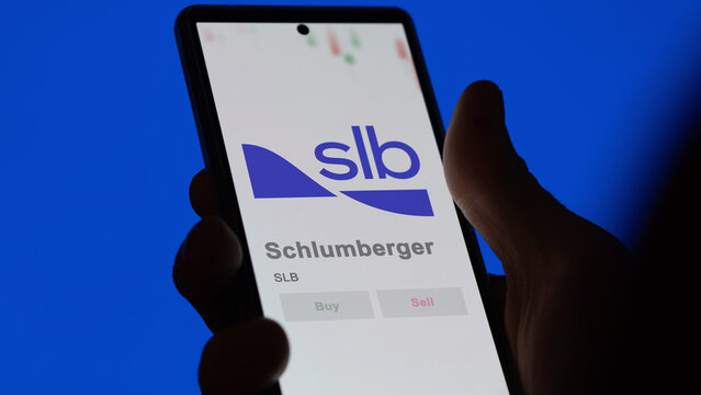 April 09th 2024 , Houston, Texas. Close up on logo of Schlumberger on the screen of an exchange. Schlumberger price stocks, $SLB on a device.