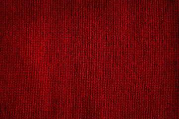 Red fabric texture background. Texture of red sweater