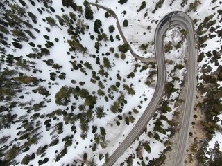 Winding country road and mountains covered in snow, South Lake Tahoe, California, United States of...