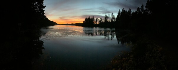 Scenic view of Honeyman Lake at sunset in Florence, Oregon