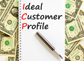 ICP ideal customer profile symbol. Concept words ICP ideal customer profile on beautiful white note. Beautiful dollar bills background. Business ICP ideal customer profile concept. Copy space.