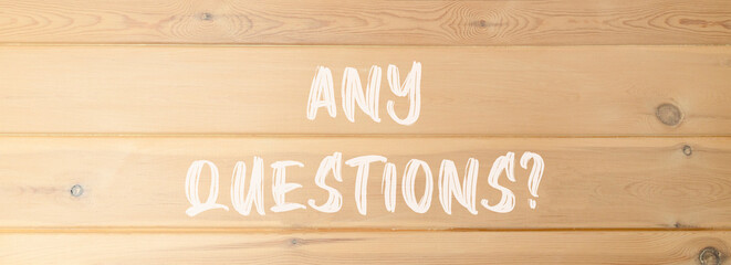 Any questions symbol. Concept words Any questions on beautiful wooden wall. Beautiful wooden wall background. Business and Any questions Q and A concept, copy space.
