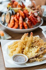 Seafood platter with oysters, prawns and crab in a restaurant