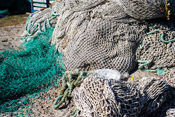pile of trawl ropes and nets with drawn ropes and footrope