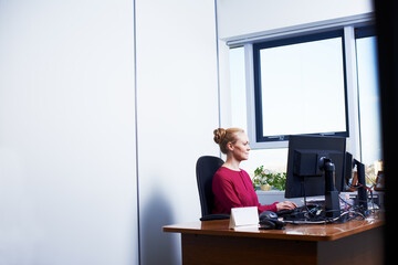 Business woman, computer and working on legal brief at office with mockup. Lawyer, web planning and...