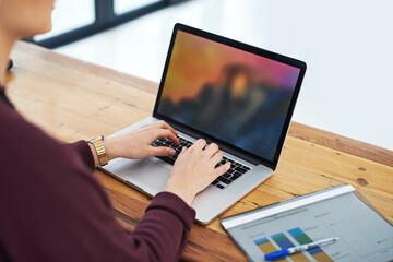 Woman, business and hands with laptop in office to analyse income chart or strategy graph tor...