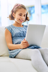 Relax, tablet and happy girl child in home on sofa for game, show or streaming movie online in living room. Kid, smile and digital tech in lounge for download, website and watch cartoon on app