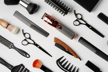 Pattern of various shaving and bauty care accessories for men on gray background