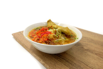 Indonesian famous street food Soto Ayam : Soto is a traditional Indonesian soup mainly composed of broth, chicken and vegetables.