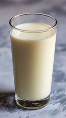 Milk swirls in a glass, pure and comforting, a symbol of wholesome nourishment