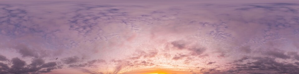 360 panorama of glowing sunset sky with bright pink Cumulus clouds. HDR 360 seamless spherical...