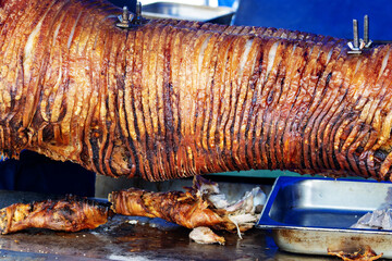 pig roast or hog roast barbecuing  a whole pig. Pig roasts common traditional celebration