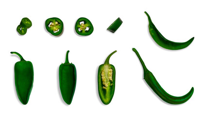 Collection of green chili peppers, jalapenos, whole, cut, half, slices on isolated transparent...