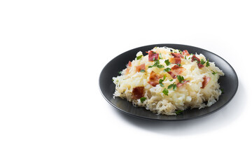 Slovak potato dumplings halusky with steamed sauerkraut and bacon isolated on white background. Copy space