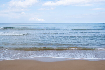 Cyprus sandy beaches. Cyprus Alagadi Turtle Beach. View from the beach to the sea. Magnificent beach, sea and blue cloudy sky.