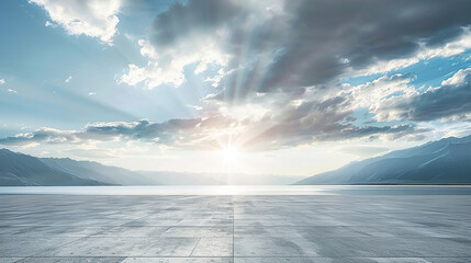A wide empty floor with a lake and sky background, with clouds in the distance and mountains on both sides, creating an atmosphere of calmness and tranquility.