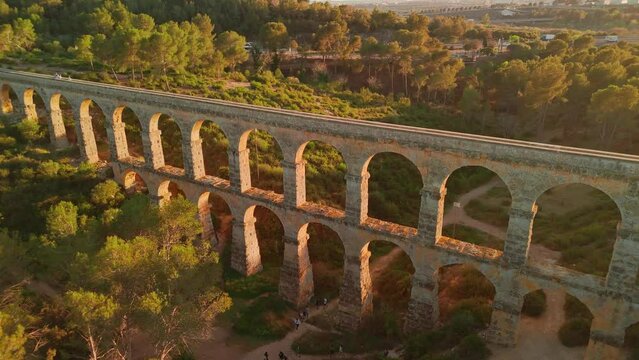 Aerial view of the Tarragona Aqueduct at sunset in Catalonia, Spain.