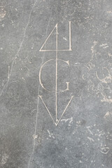 Symbol engraving on a floor slab of the Hooglandse Kerk in Leiden