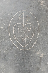Symbol engraving on a floor slab of the Hooglandse Kerk in Leiden