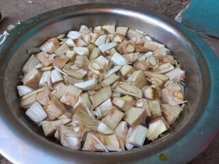 chopped jackfruit peel, Iron knife jackfruit Vegetable cut picture Photography,Water dipped cutting jackfruit Vegetable of Aluminum pot,Put small chopped pieces of jackfruit in an aluminium vessel,