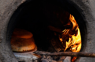 bread cooking in the old oven, high atlas morocco 
