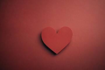 red heart on wooden background