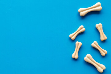 Food and treats for pets - chew bones, top view
