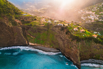 Aerial view of rough ocean with  huge cliff and waves, volcanic beach in Guindaste viewpoint in...