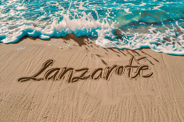 Lanzarote, Spain written in the sand on a beach. Spanish tourism and vacation background