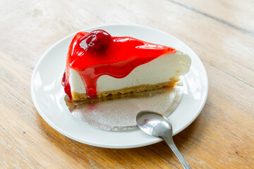 Strawberry cake with red fruit sauce