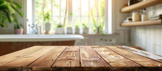 Wooden table against a blurred background of a bathroom window and shelves.