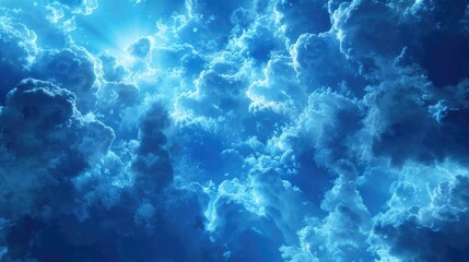 Fototapeta premium A picturesque blue sky filled with fluffy white clouds. Perfect for backgrounds or nature-themed designs