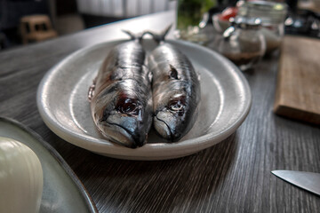 fish in the kitchen before cooking