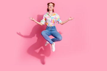 Full length body photo size of beautiful satisfied young woman flying lotus pose focused meditation isolated on pink color background
