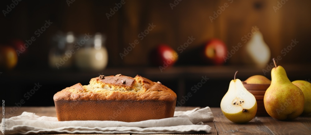 Poster A delicious pear bread is laid out on a wooden table with ample room for text in the composition s copy space image