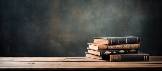 A copy space image showing books resting on a table