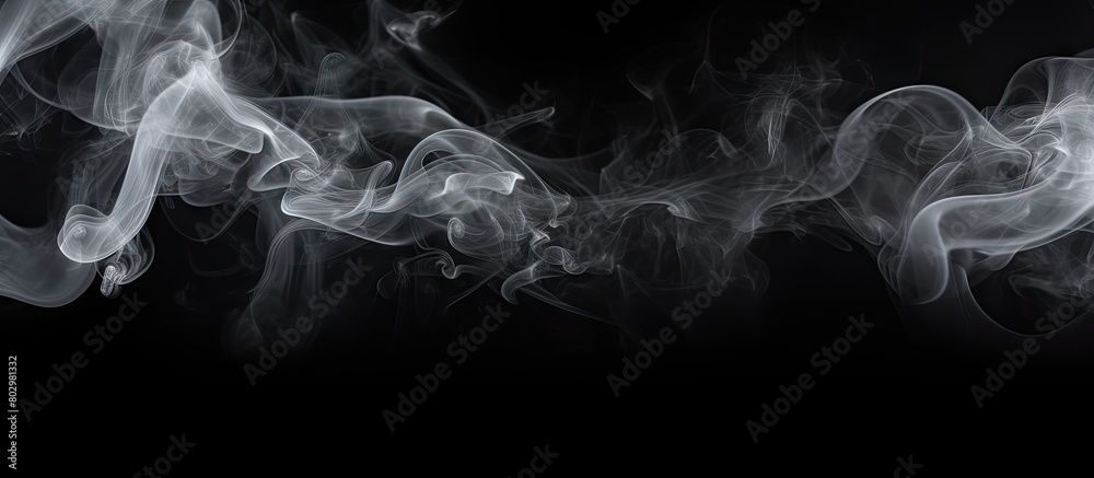 Poster a black background hosts a collection of white smoke in this copy space image