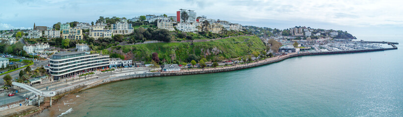 Torquay seafront aerial panorama image. English riviera with cafe's, bars.Torquay marina in the...