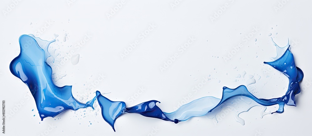 Poster A blue paper with torn edges is placed on a white paper background creating a copy space image
