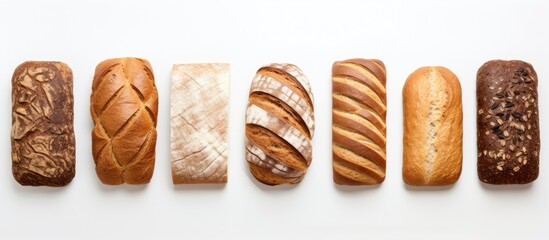 A chart displaying different types of wholemeal bread on a white surface with plenty of space for additional images