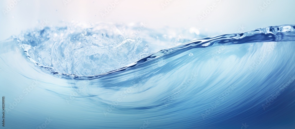 Poster A copy space image captures the mesmerizing dance of water droplets forming circles swirling splashing and creating ripples on a textured sea pattern
