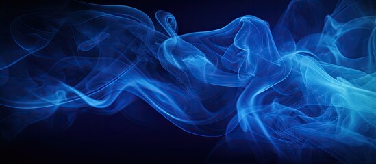 A blue vapor contrasting against a dark backdrop with ample room for additional content in the image