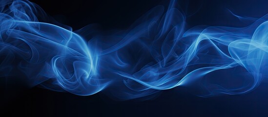 Fototapeta premium A blue vapor contrasting against a dark backdrop with ample room for additional content in the image