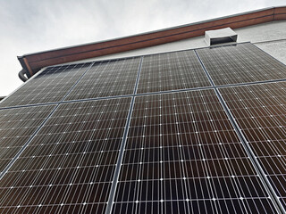 close view on a big black solar panel technology progress