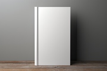 Minimalistic Book with Checkered Patterns Against Gray Background