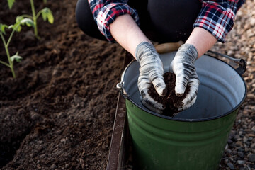 The farmer pourvu new soil, soil for a new greenhouse. The concept of spring planting of vegetables...