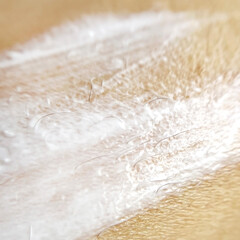 Body skin texture with sunscreen on it