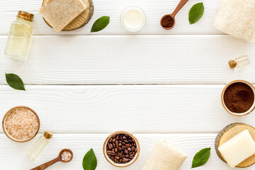 Frame of organic spa body care cosmetic with coffee soap and scrub